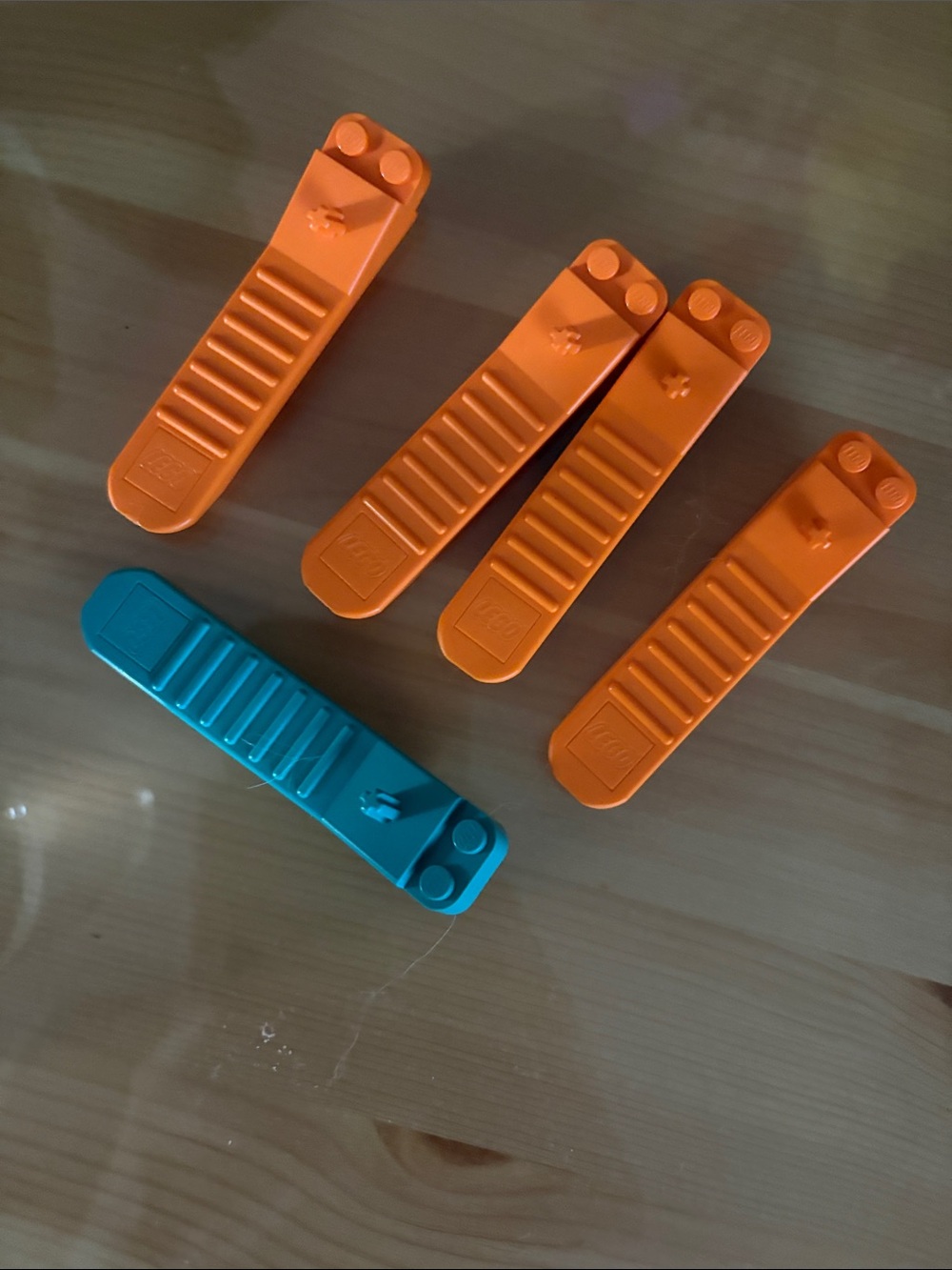 Set of Orange and Teal Plastic Lego Levers